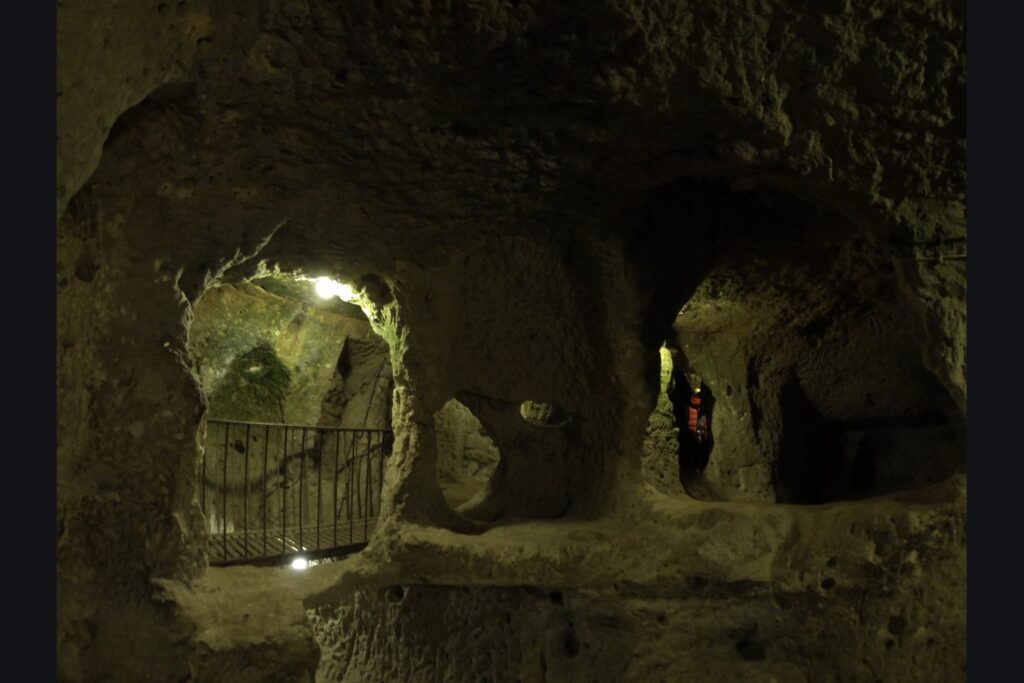 A narrow carved passage in the Derinkuyu underground city in Cappadocia